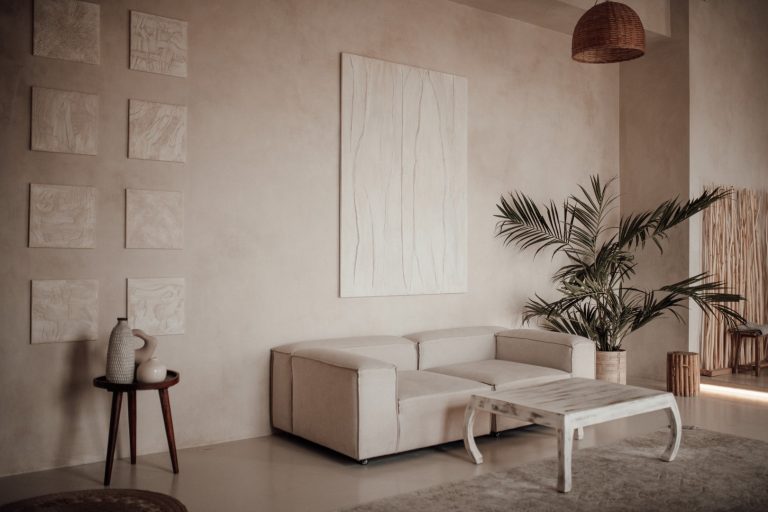 Modern home decor in a minimalist living room with neutral color palette and contemporary furniture.
